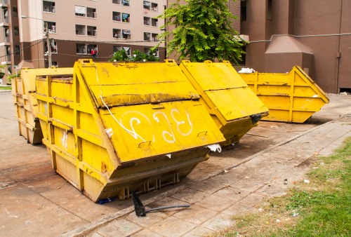 Professional muck away team removing construction debris in Millbank