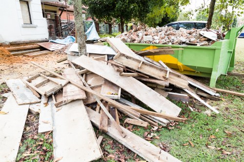 Residential area in Millbank with a skip for household waste