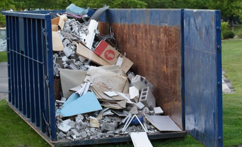 Enclosed skip for secure waste disposal in Millbank
