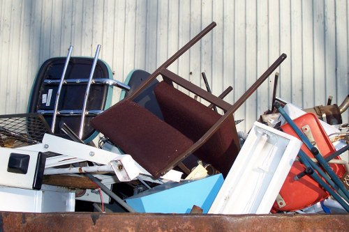 Workers sorting recyclables at a local transfer station